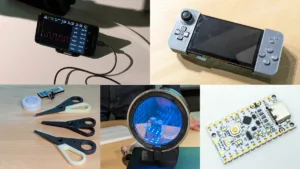 Smartphone on a stand displaying a waveform on an oscilloscope app with connected cables on a table.
