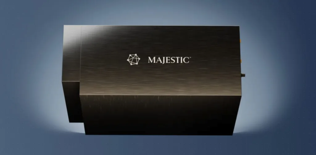 Brushed metal Majestic hardware enclosure centered on a dark base, Majestic logo visible.