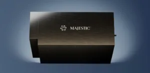 Brushed metal Majestic hardware enclosure centered on a dark base, Majestic logo visible.