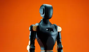 Humanoid robot with a dark blue chassis and gold shoulder joints against an orange background.