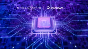 Purple-toned circuit board with a glowing central processor, featuring Stellantis and Qualcomm logos to indicate a tech partnership.