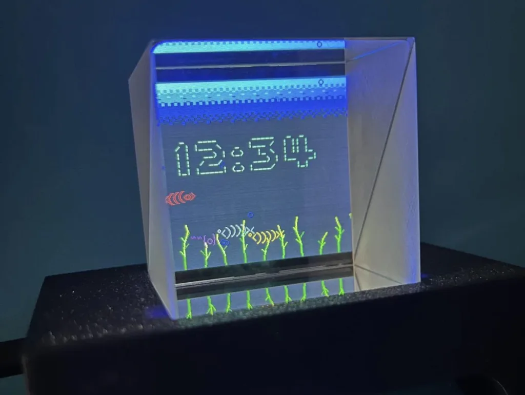 Glass digital display with blue LEDs showing '12:34' and green plant silhouettes at the bottom.