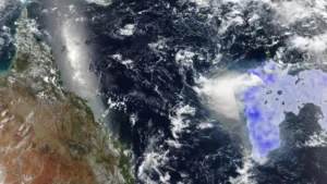 Satellite view of Earth from space showing the northwestern African coast on the left, the Atlantic Ocean in the center, and a purple overlay over a coastal region on the right.
