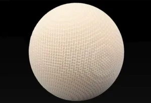White textured sphere with a grid-like pattern on a black background.