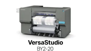 Roland VersaStudio BY2-20 wide-format printer printing color sheets from a roll