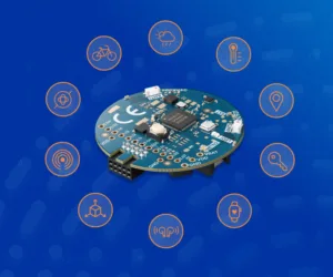 Circular IoT development board at the center with surrounding icons for cloud, temperature, location, cycling, wireless signal, and sensors indicating connected features.